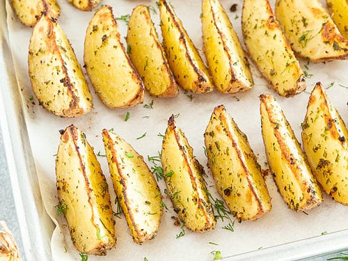 https://www.valyastasteofhome.com/wp-content/uploads/2019/11/The-Best-Crispy-Baked-Potato-Wedges-Perfect-Side-Dish-2-500x375.jpg