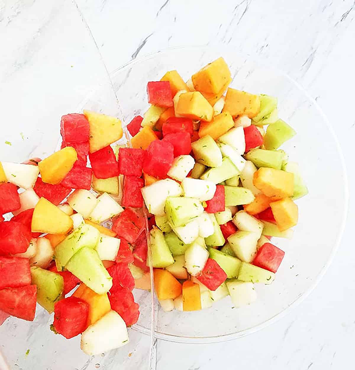 https://www.valyastasteofhome.com/wp-content/uploads/2020/07/The-Perfect-Melon-Fruit-Salad-Classic-Summer-Salad-5.jpg